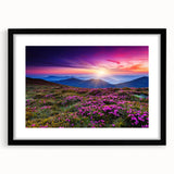 Framed wall art showcasing a serene landscape of rolling green fields, elegantly displayed in a sleek black frame with a mat, enhancing any decor.