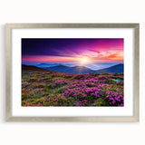 Framed wall art collection featuring serene landscapes of rolling green fields, displayed in an elegant silver frame with a white mat, ideal for home decor.