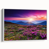 Framed canvas wall art showcasing a serene landscape with vibrant green fields and a soft blue sky, elegantly displayed in a white frame for modern decor.