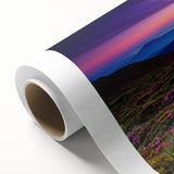 Vibrant rolled canvas showcasing a serene landscape with lush green fields and a clear blue sky, perfect for adding a touch of nature-inspired decor to any space.
