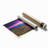 Serene landscape wall art print showcasing vibrant green fields under a clear blue sky, rolled and ready for display in a stylish home or office setting.