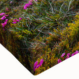 Close-up of a stretched canvas showcasing a vibrant landscape field design, featuring lush green hues and soft blue skies, ideal for home decor enhancement.