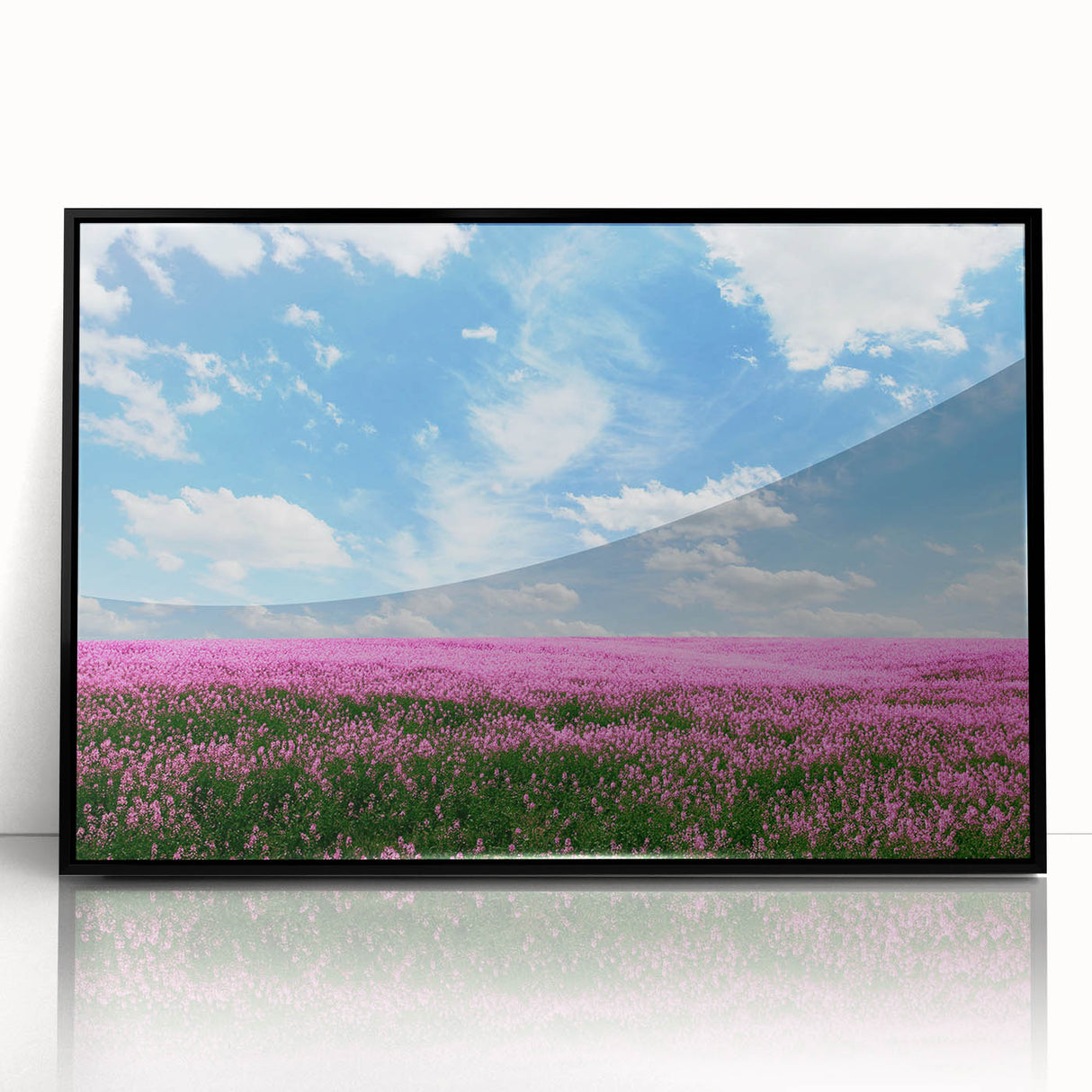 Framed acrylic wall art featuring a vibrant landscape design with fields in rich green and golden hues, elegantly displayed in a sleek black frame for modern decor.