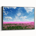 Framed canvas wall art showcasing a vibrant landscape design with fields and rolling hills, featuring a sleek black frame, ideal for home decor.