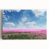 Stretched canvas wall art showcasing a serene landscape of vibrant green fields under a clear blue sky, perfect for home decor. Ideal for nature lovers and interior design enthusiasts.