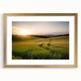Elegant gold-framed wall art featuring a serene landscape with lush green fields and a clear blue sky, perfect for enhancing home decor and creating a tranquil atmosphere. Ideal for art enthusiasts seeking to elevate their living space with nature-inspired designs.