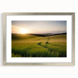 Framed wall art depicting serene landscapes and fields, featuring a silver mat and stylish frame, ideal for enhancing home decor with nature-inspired elegance.
