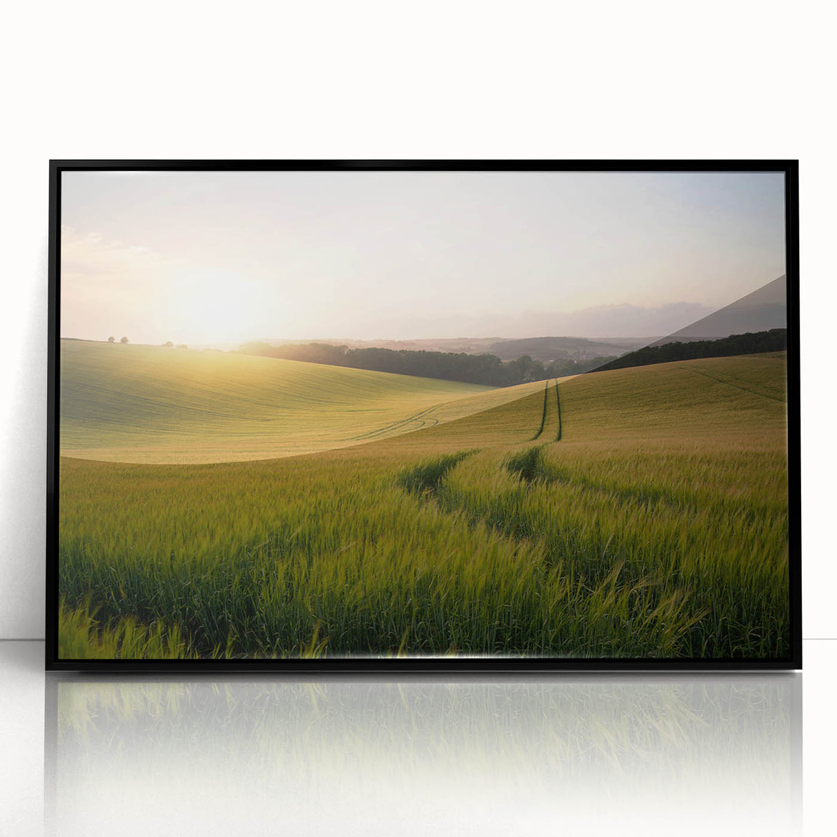 Framed black acrylic wall art showcasing a vibrant landscape design featuring rolling green fields and a serene sky, ideal for enhancing modern decor.