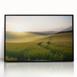 Framed black acrylic wall art showcasing a vibrant landscape design featuring rolling green fields and a serene sky, ideal for enhancing modern decor.