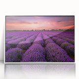 Framed wall art collection showcasing a vibrant landscape design with fields and blue skies, set against a white frame, perfect for home decor enhancement.