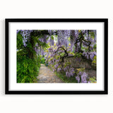 Framed wall art featuring a vibrant landscape garden design in a black frame with a mat, showcasing lush greenery and serene nature elements, ideal for home decor.