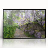Framed acrylic wall art showcasing a vibrant landscape garden design with lush greenery and colorful flowers, set in a sleek black frame. Ideal for enhancing home decor.