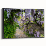 Framed canvas wall art showcasing a vibrant landscape garden design, featuring lush greenery and colorful flowers, with a sleek black frame, ideal for home decor.