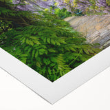 Rolled canvas artwork showcasing a vibrant landscape garden design with lush greenery and colorful flowers, ideal for home decor or office spaces, wrapped securely for safe delivery.