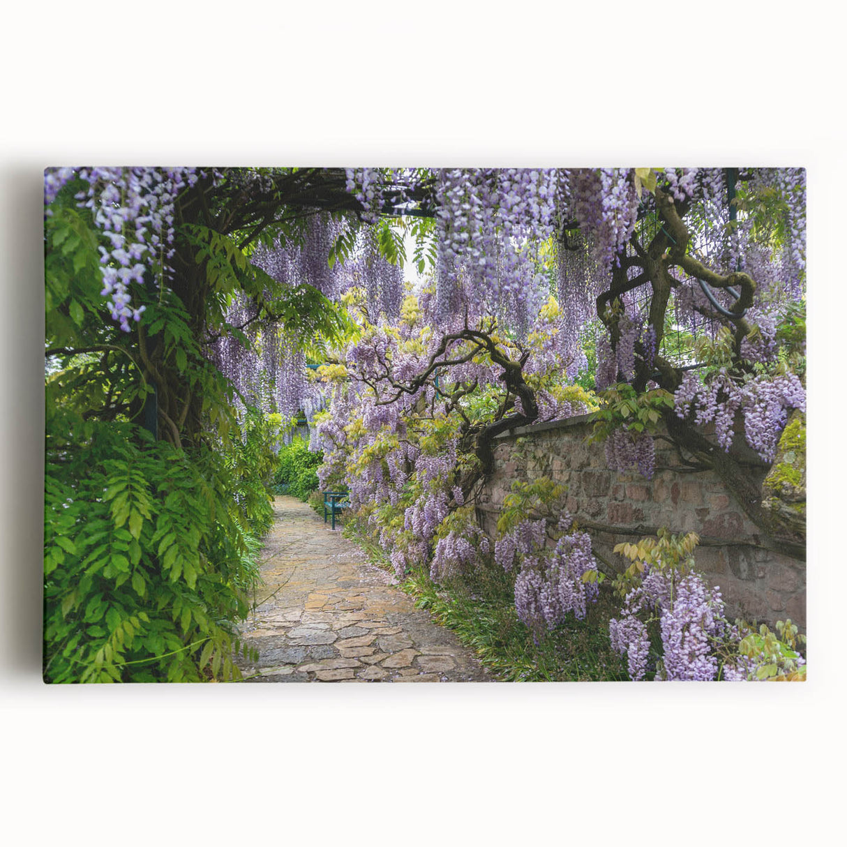 Vibrant stretched canvas wall art showcasing a serene landscape garden design, featuring lush greenery and a tranquil blue sky, perfect for home decor.