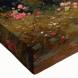 Close-up of a stretched canvas artwork showcasing a vibrant landscape garden design with rich colors and intricate details, perfect for home decor enhancement.