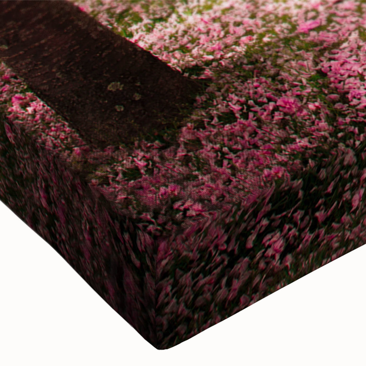 Close-up of a stretched canvas wall art piece showcasing a vibrant landscape garden design, featuring lush greenery and colorful flowers, perfect for home decor.