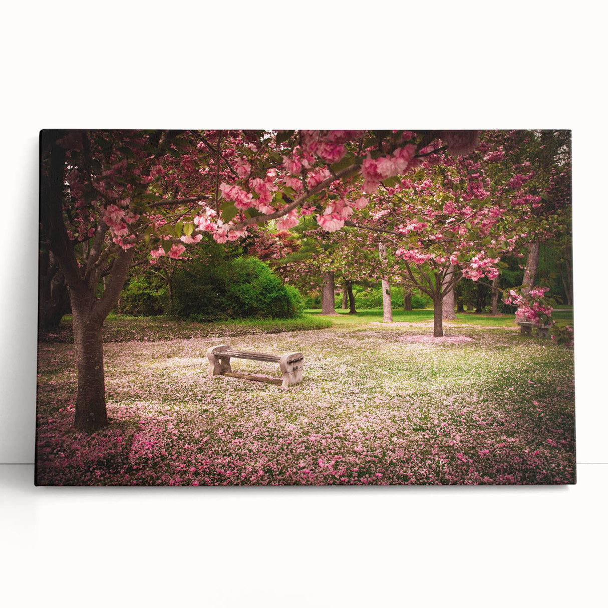 Stretched canvas artwork showcasing a vibrant landscape garden design, featuring lush greenery and colorful floral elements, ideal for home decor.
