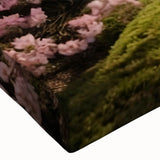 Close-up of a stretched canvas wall art piece showcasing a vibrant landscape garden design, featuring lush greenery and colorful flowers, perfect for home decor.