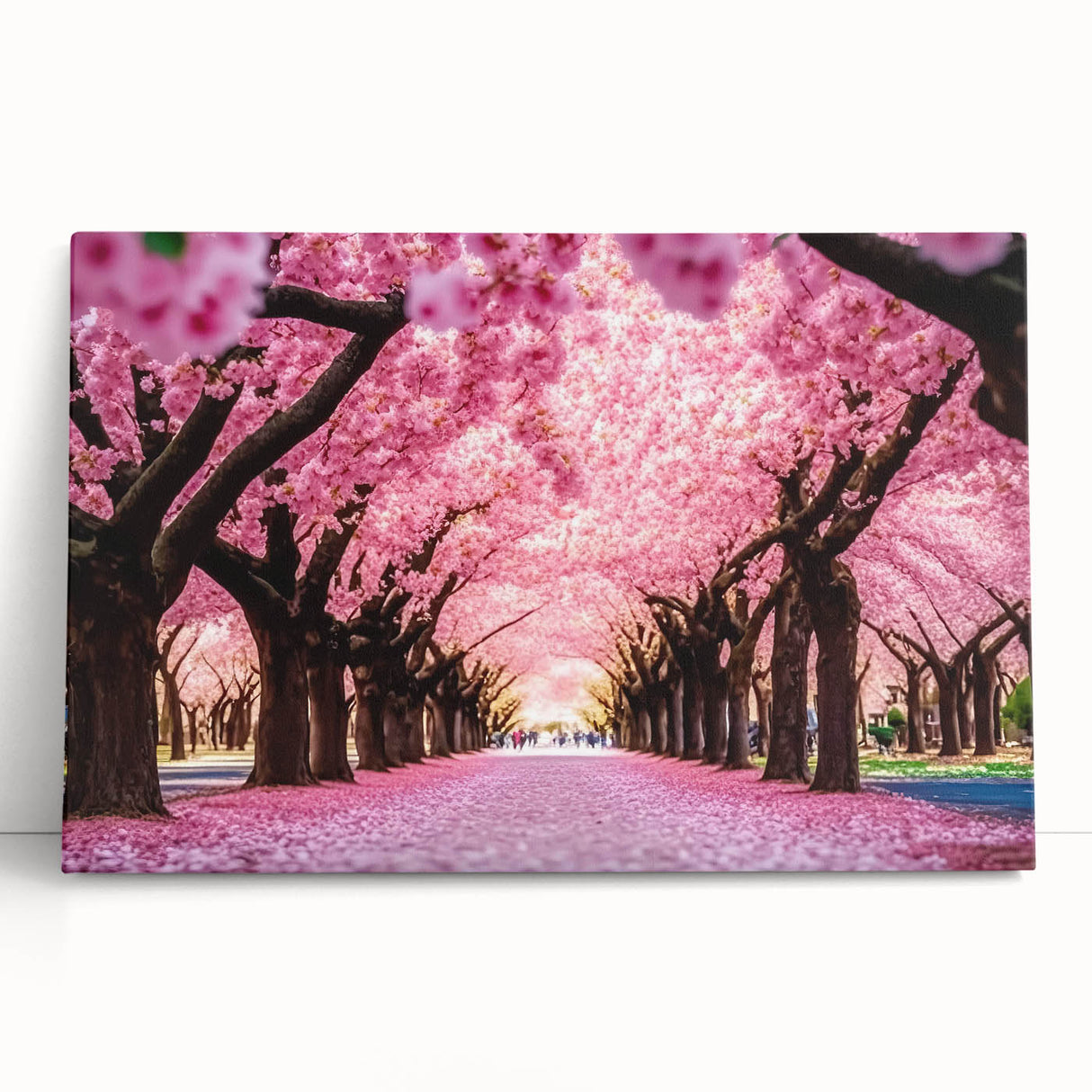 Stretched canvas wall art collection showcasing vibrant landscapes and garden designs, elegantly leaning against a wall, ideal for home decor enthusiasts.