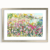 Elegant silver-framed wall art featuring a serene landscape design, complete with a white mat for added depth, perfect for enhancing home decor in any setting.