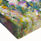 Close-up of a vibrant stretched canvas featuring a colorful landscape garden design, showcasing intricate details and textures, perfect for home decor enhancement.