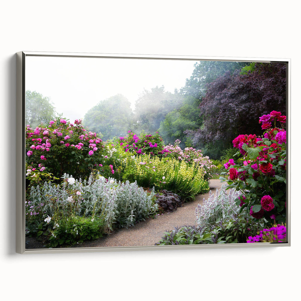 Framed canvas artwork showcasing a serene landscape garden design, featuring vibrant colors and intricate details, presented in a sleek silver frame for elegant home decor. Ideal for enhancing living spaces with a touch of nature-inspired beauty.