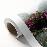 Vibrant rolled canvas showcasing a serene landscape garden design, featuring lush greenery and colorful flowers, perfect for enhancing home decor.