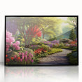 Framed acrylic wall art showcasing a serene landscape garden design, featuring vibrant green foliage and colorful flowers, set in a sleek black frame for modern decor.