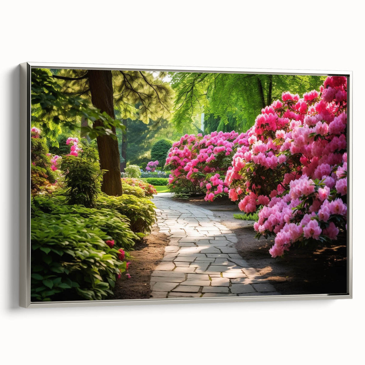 Framed canvas wall art showcasing a vibrant garden landscape design, featuring lush greenery and colorful flowers, elegantly displayed with a sleek silver frame. Ideal for home decor.