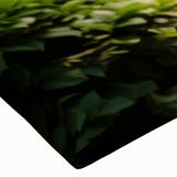 Close-up of a stretched canvas wall art piece showcasing a vibrant landscape garden design, featuring lush greenery and colorful flowers, ideal for home decor.