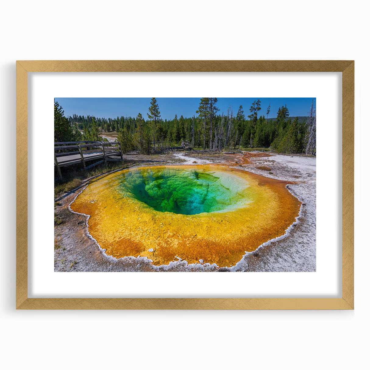 Framed wall art featuring a stunning geyser landscape design in vibrant colors, accented with a gold frame and mat, ideal for home decor and aesthetic enhancement.