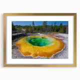 Framed wall art featuring a stunning geyser landscape design in vibrant colors, accented with a gold frame and mat, ideal for home decor and aesthetic enhancement.