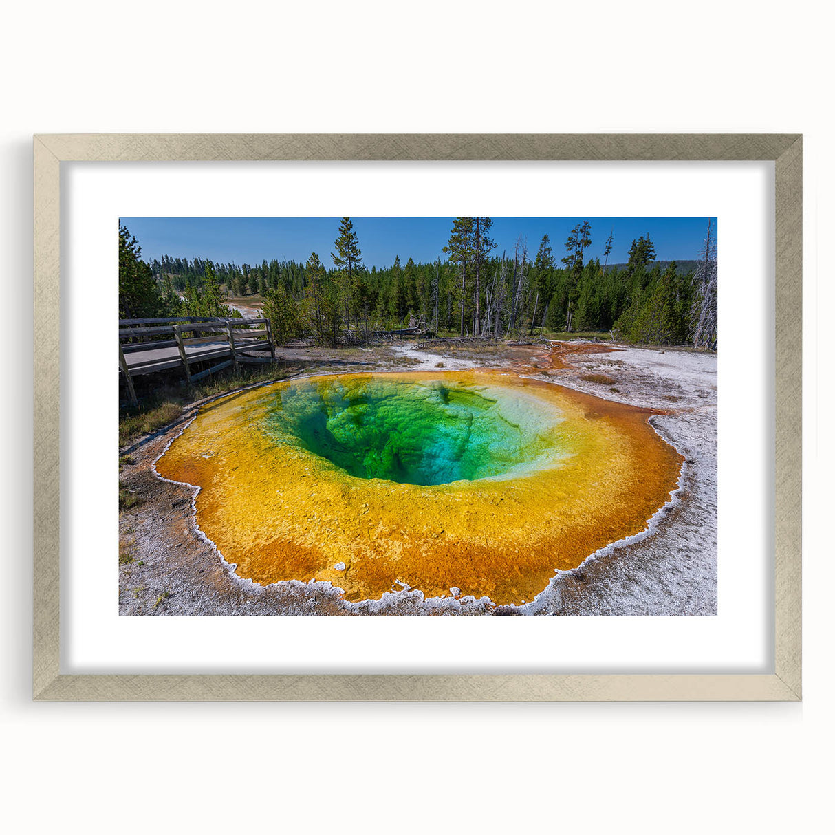 Framed wall art featuring a geyser landscape design in silver frame, showcasing vibrant colors and intricate details, perfect for home decor enhancement.