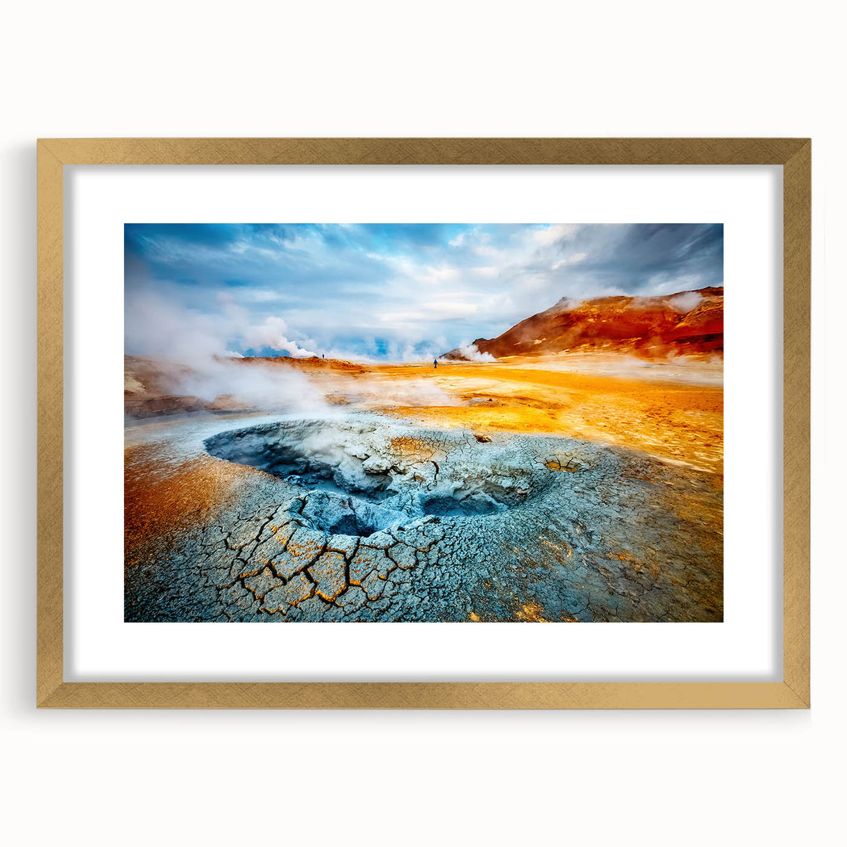 Framed wall art featuring a stunning geyser landscape design with a gold mat and frame, perfect for enhancing home decor with a natural aesthetic.