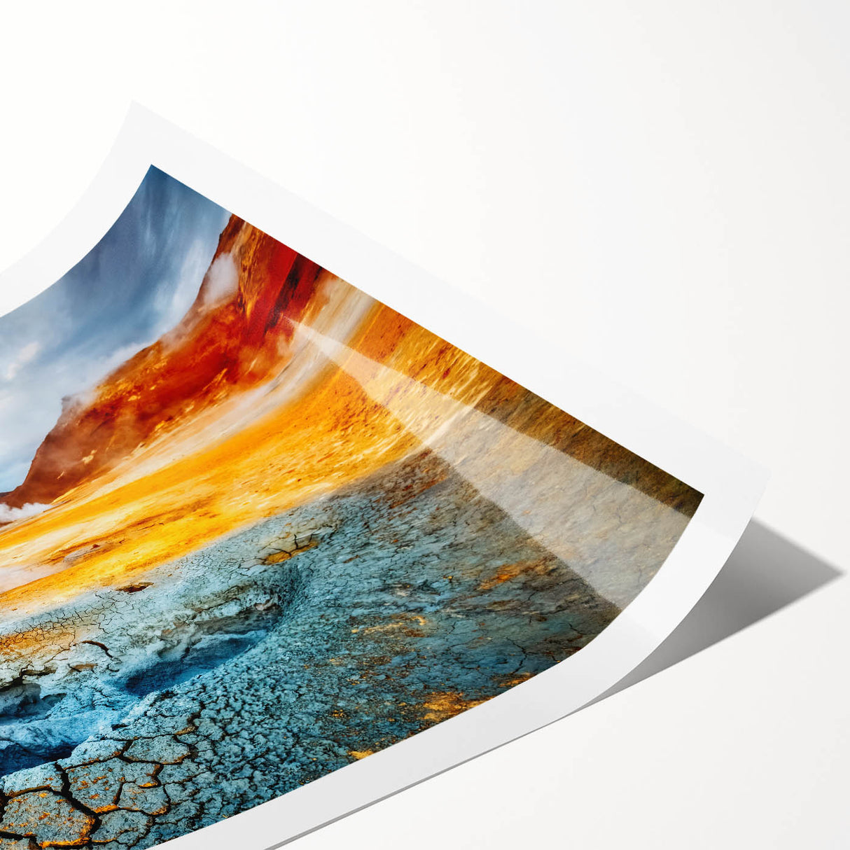 Vibrant rolled print showcasing a geyser landscape design, featuring rich colors and intricate details, perfect for enhancing home decor aesthetics.