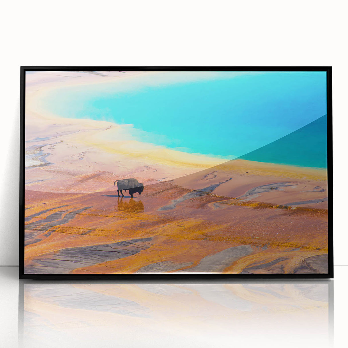 Framed acrylic wall art featuring a striking geyser landscape design, presented in a sleek black frame, perfect for enhancing modern home decor and interior aesthetics.