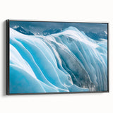 Framed canvas wall art featuring a stunning glacier landscape design with a black frame, showcasing vibrant blues and whites, perfect for modern decor.