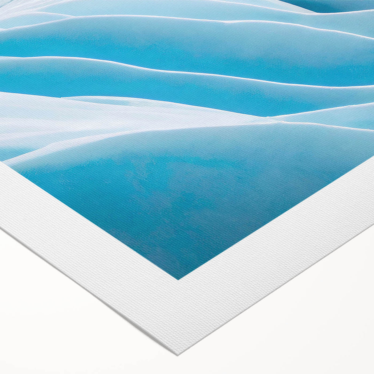 Vibrant rolled canvas print showcasing a stunning glacier landscape design with rich blue and white hues, perfect for home decor and artistic expression.