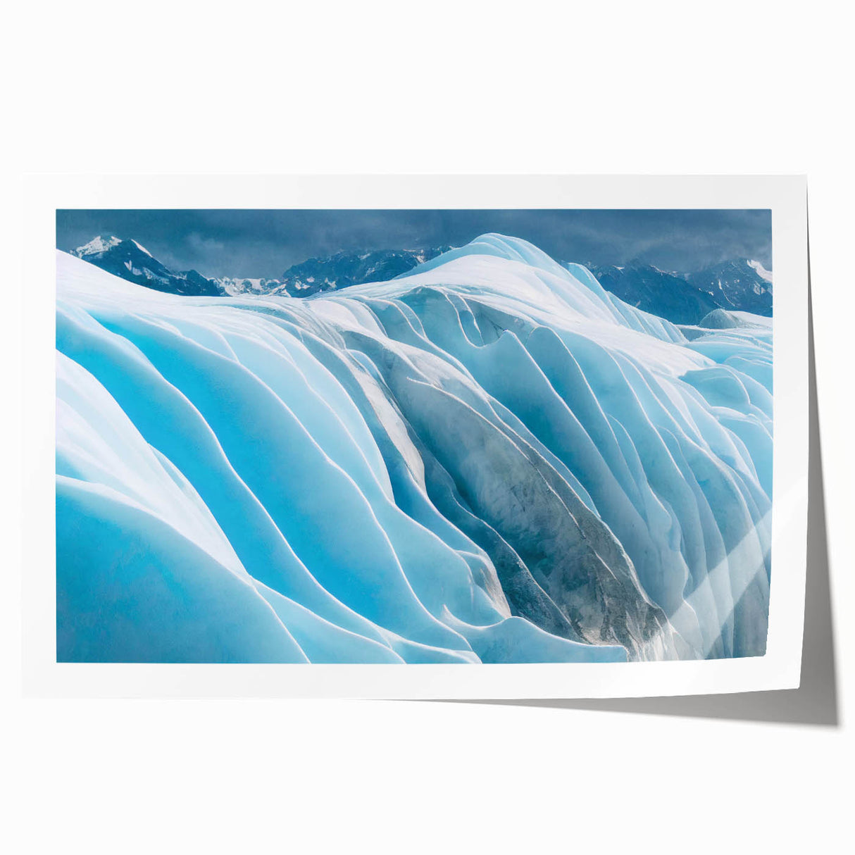 Glacier-themed wall art print showcasing stunning icy landscapes with vibrant blues and whites, beautifully rolled for easy display and shipping. Perfect for modern home decor.