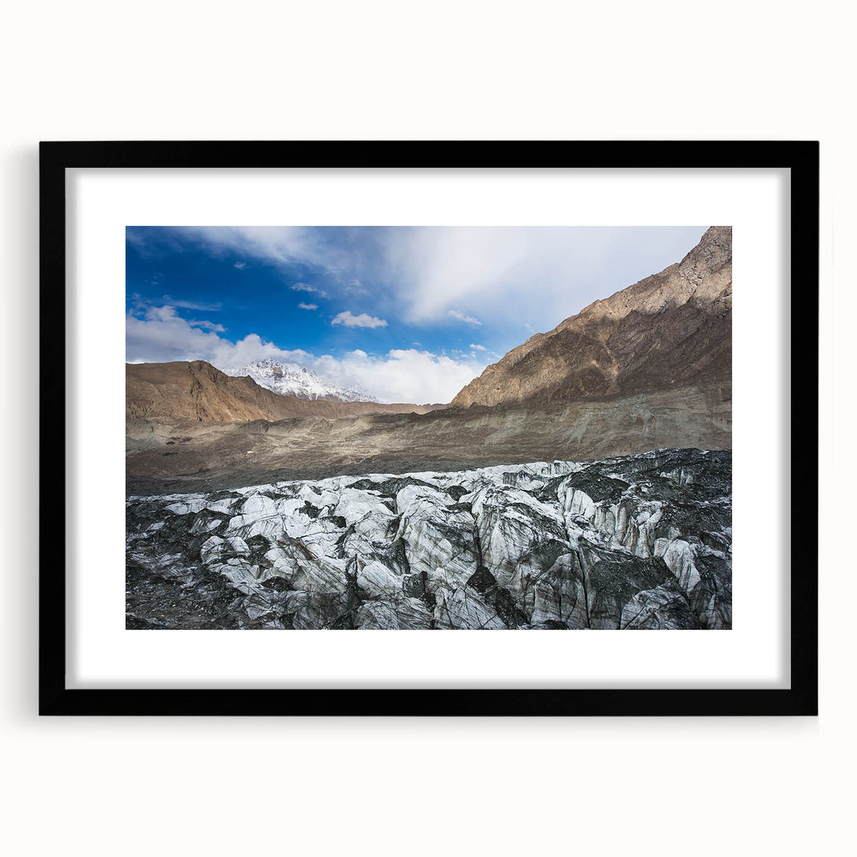 Framed black wall art featuring a stunning glacier landscape design, showcasing icy blues and whites, perfect for modern home decor and nature enthusiasts.