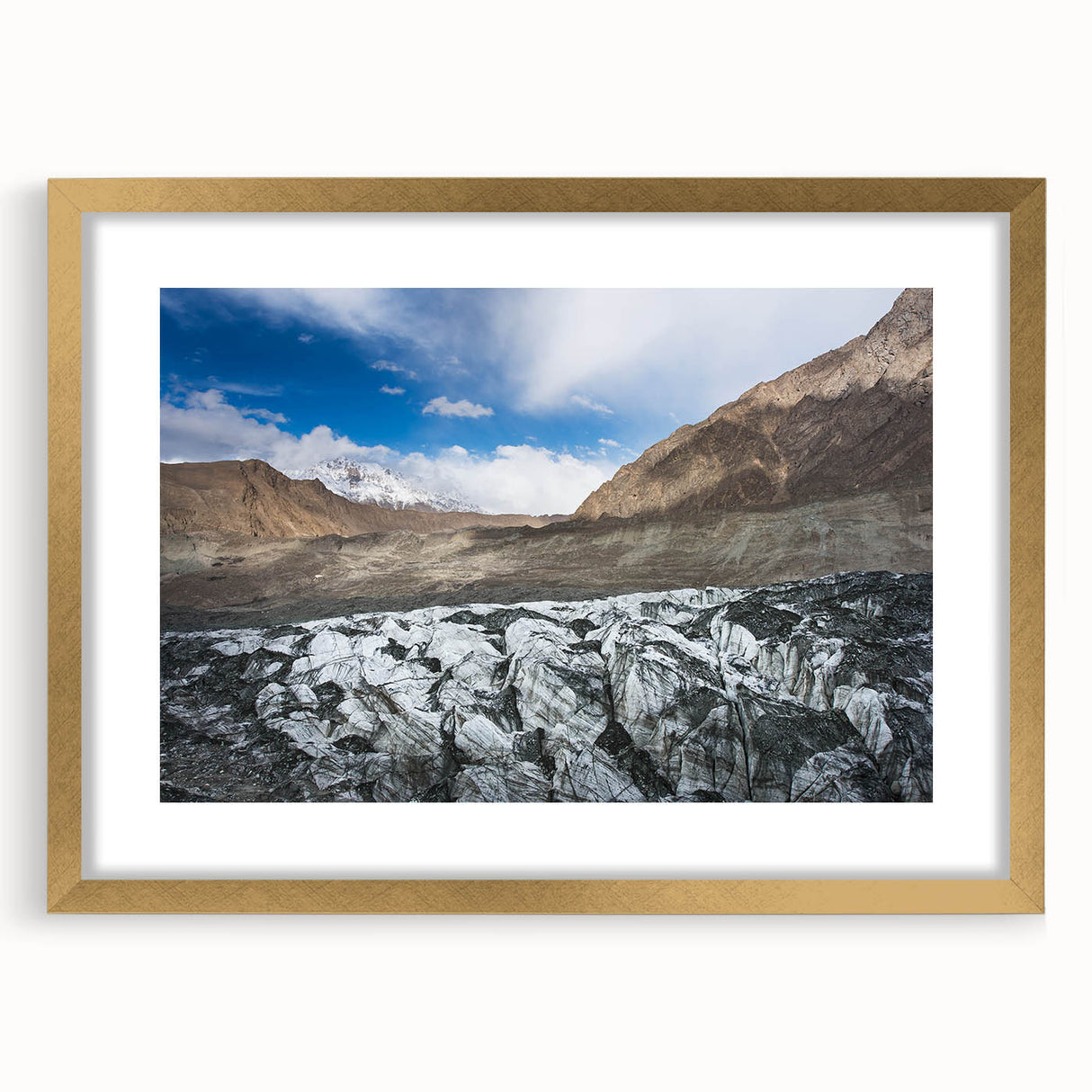 Framed wall art featuring a stunning glacier landscape design, with a gold mat and frame, ideal for enhancing modern home decor. Perfect for nature lovers.