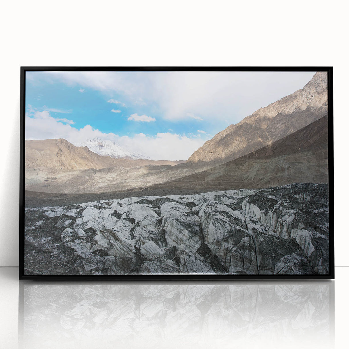 Framed acrylic wall art featuring a stunning glacier landscape design, with a sleek black frame highlighting the vibrant blue and white colors of the ice formations. This piece adds a modern touch to any decor while showcasing the beauty of nature.