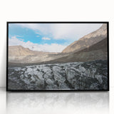 Framed acrylic wall art featuring a stunning glacier landscape design, with a sleek black frame highlighting the vibrant blue and white colors of the ice formations. This piece adds a modern touch to any decor while showcasing the beauty of nature.