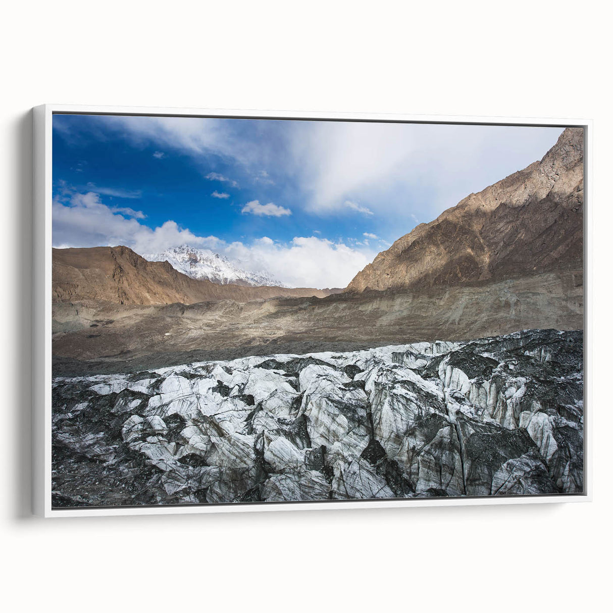 Framed canvas wall art showcasing a serene glacier landscape design, featuring cool blue tones and intricate details, enhancing any modern home decor setting.