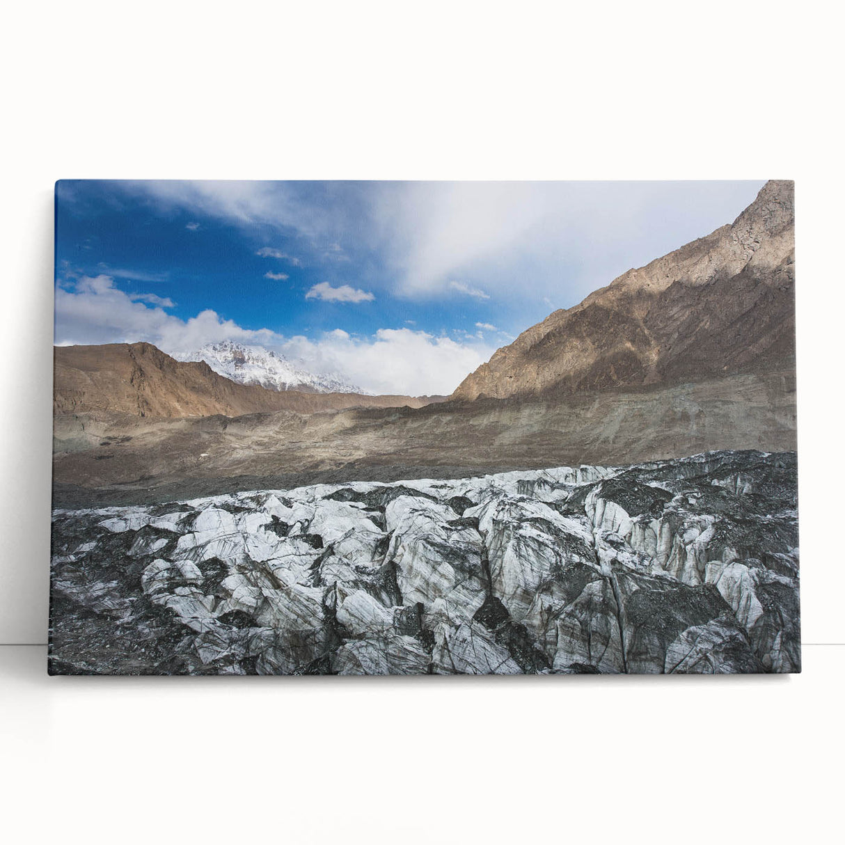 Stretched canvas wall art showcasing a serene glacier landscape design, featuring cool blue and white tones, perfect for modern home decor.