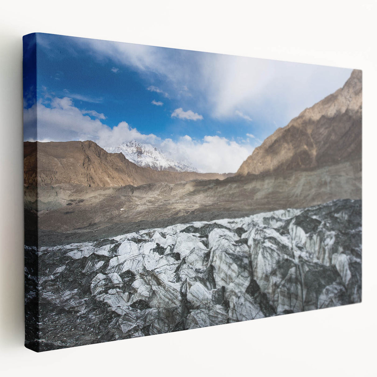 Stretched canvas wall art showcasing a stunning glacier landscape design with vibrant blues and whites, ideal for modern home decor. The side view highlights the canvas's depth and texture, perfect for adding a serene touch to living spaces.