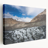 Stretched canvas wall art showcasing a stunning glacier landscape design with vibrant blues and whites, ideal for modern home decor. The side view highlights the canvas's depth and texture, perfect for adding a serene touch to living spaces.
