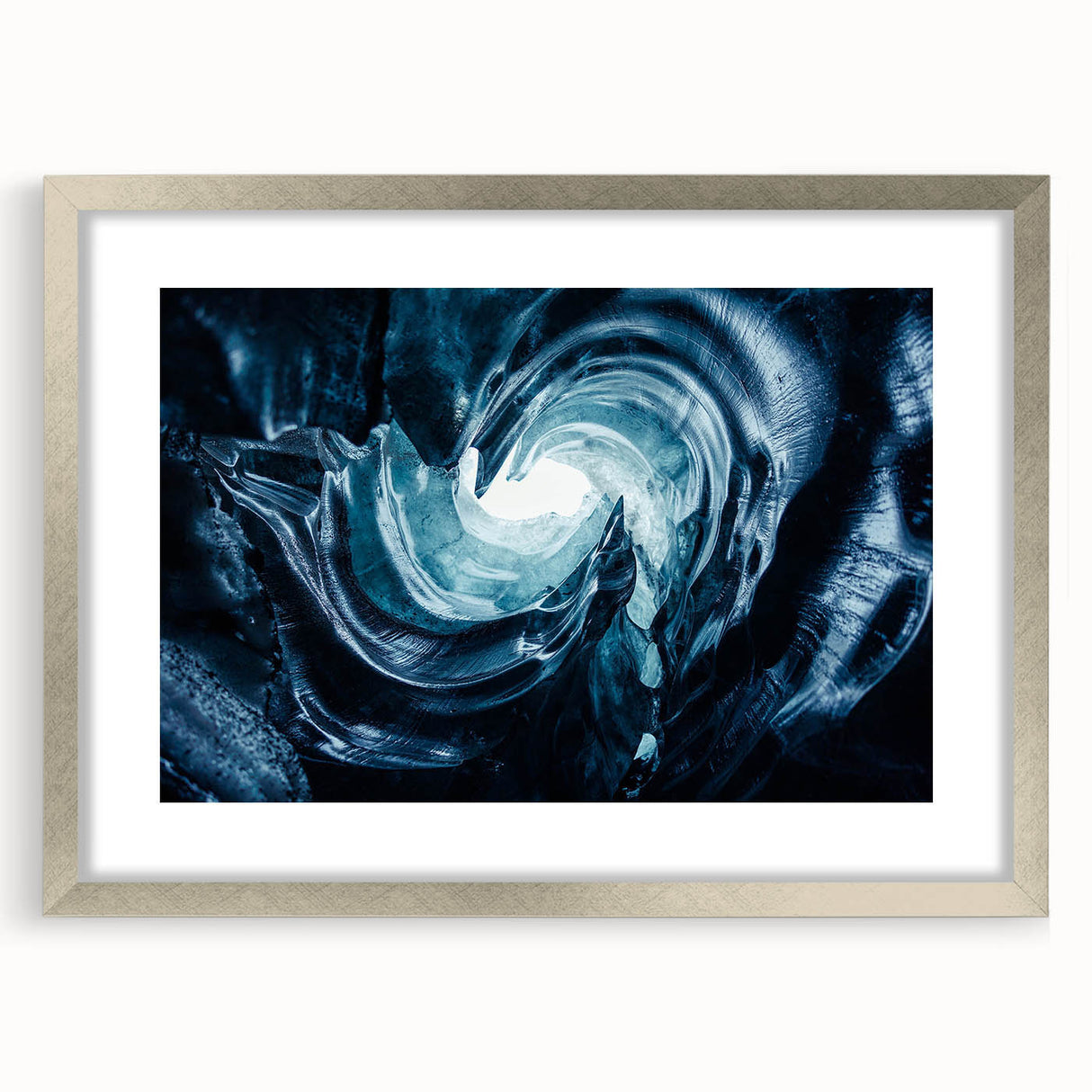 Framed wall art featuring a stunning glacier landscape design, showcasing vibrant blues and whites in a silver frame with a mat, perfect for home decor.