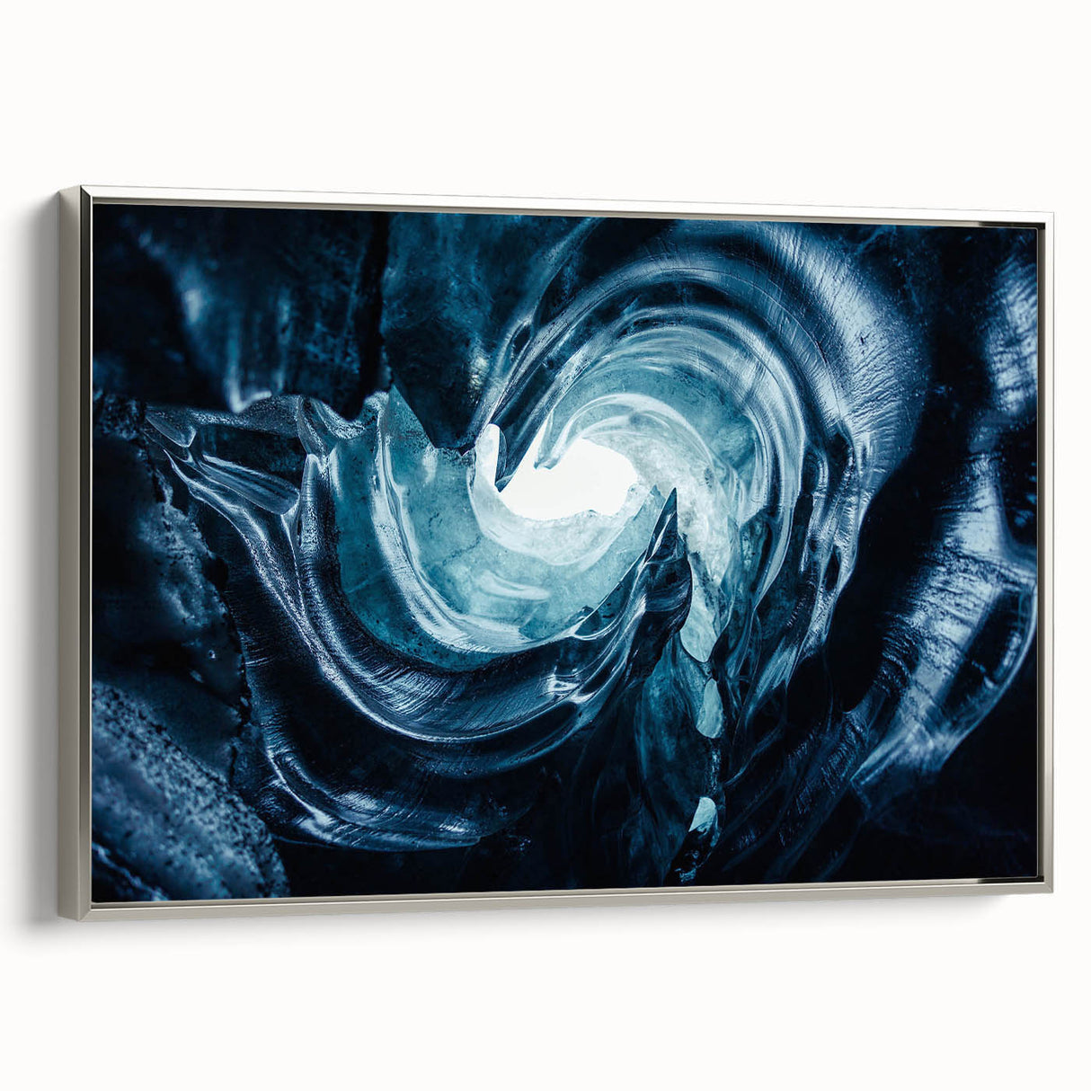 Framed canvas wall art showcasing a stunning glacier landscape design with silver accents, displayed from a side view, perfect for modern home decor.
